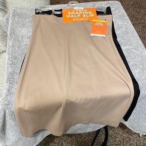 New with tags size M half slip, one beige one black